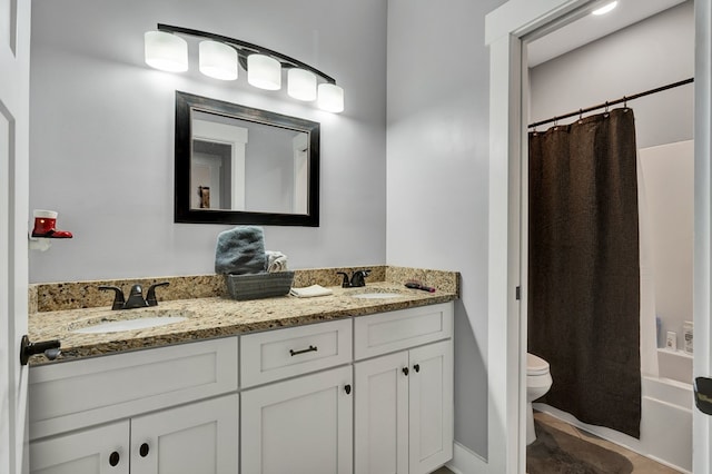 full bathroom with vanity, toilet, and shower / bathtub combination with curtain