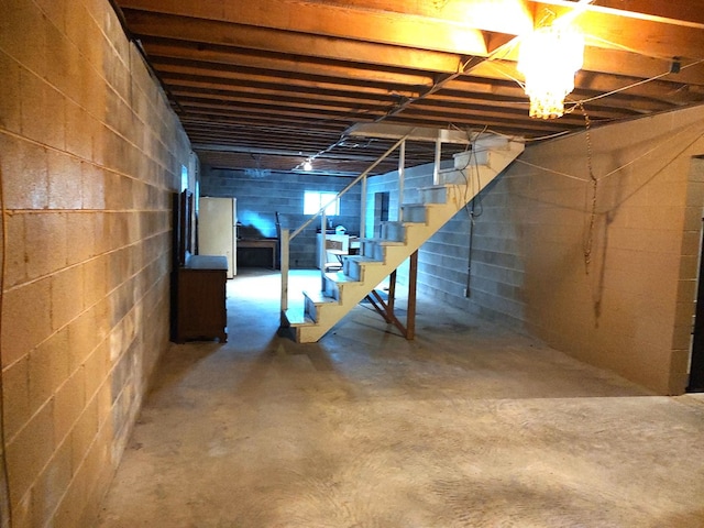 basement with white fridge