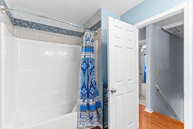 1369 Lida St, Dalton, GA 30721 - full bath featuring wood finished floors and shower / bathtub combination with curtain