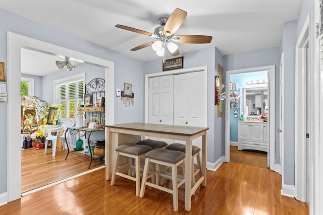 1369 Lida St, Dalton, GA 30721 - dining area featuring wood finished floors and a ceiling fan