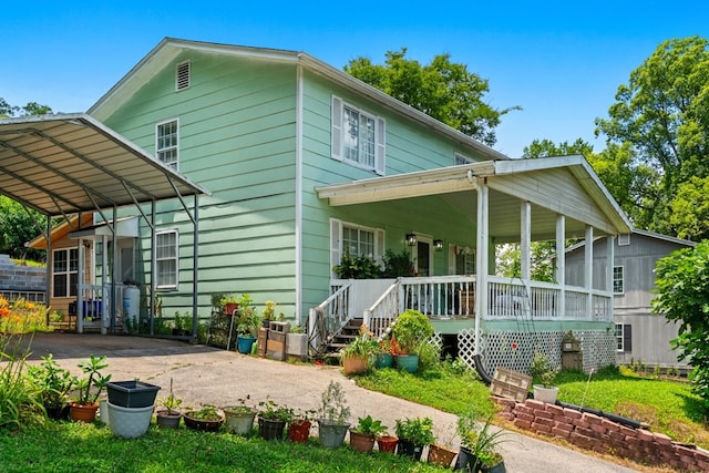 1369 Lida St, Dalton, GA 30721 - rear view of property featuring a porch