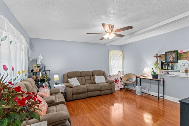 1369 Lida St, Dalton, GA 30721 - living area featuring ceiling fan, a textured ceiling, and wood finished floors
