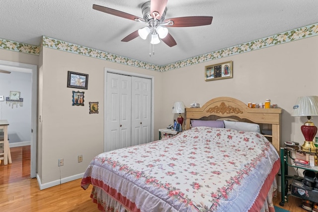 1369 Lida St, Dalton, GA 30721 - bedroom featuring light wood finished floors, a closet, a textured ceiling, and a ceiling fan