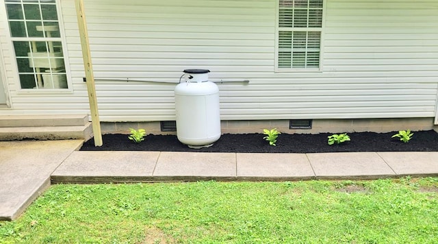 2163 Red Leaf Ln, Soddy Daisy, TN 37379 - exterior view of gas tank and crawl space