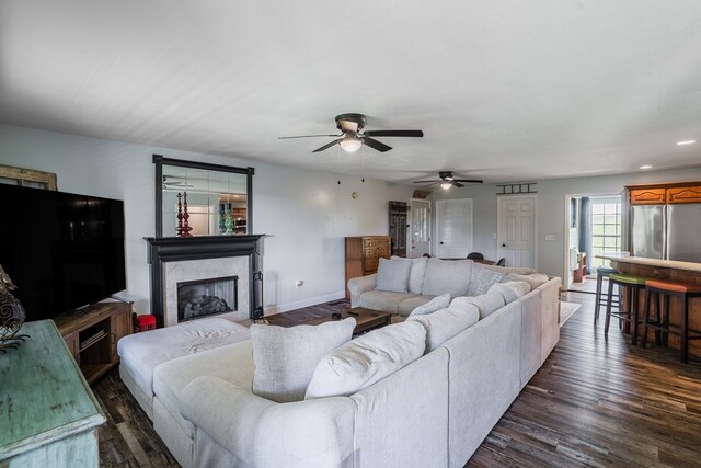 2163 Red Leaf Ln, Soddy Daisy, TN 37379 - living area with dark wood-type flooring, ceiling fan, a high end fireplace, and recessed lighting