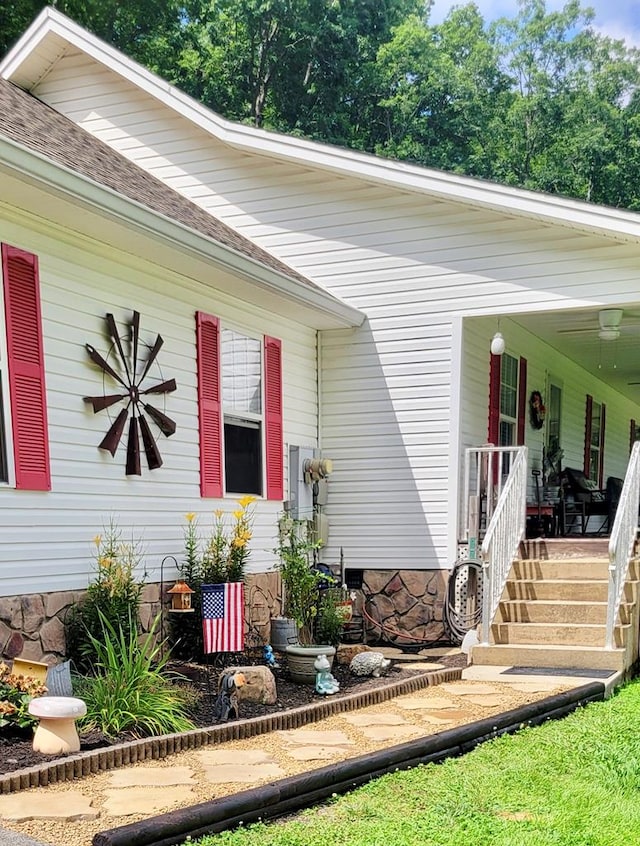 2163 Red Leaf Ln, Soddy Daisy, TN 37379 - doorway to property featuring crawl space, a porch, and roof with shingles