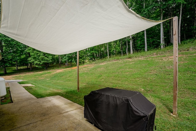 2163 Red Leaf Ln, Soddy Daisy, TN 37379 - view of grassy yard featuring a patio