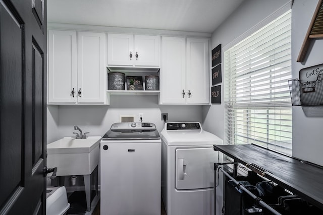 2163 Red Leaf Ln, Soddy Daisy, TN 37379 - washroom featuring separate washer and dryer and cabinet space
