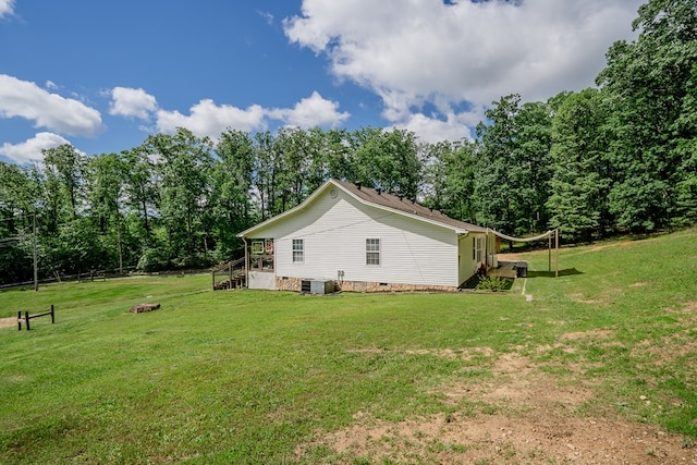 2163 Red Leaf Ln, Soddy Daisy, TN 37379 - view of property exterior with a central air condition unit and a yard