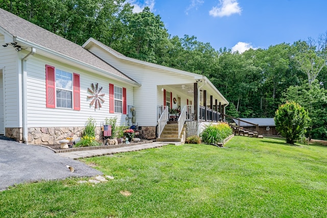 2163 Red Leaf Ln, Soddy Daisy, TN 37379 - view of front of property with a porch, a front yard, stairway, and roof with shingles