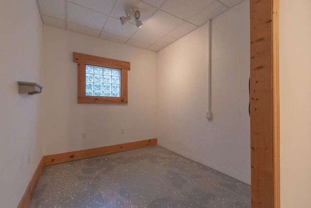 5384 Blair Rd, Cohutta, GA 30710 - empty room with baseboards, a drop ceiling, and concrete floors