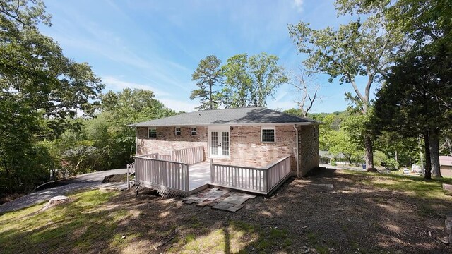 42 Travis Rd, Rossville, GA 30741 - rear view of property featuring french doors, a deck, and brick siding
