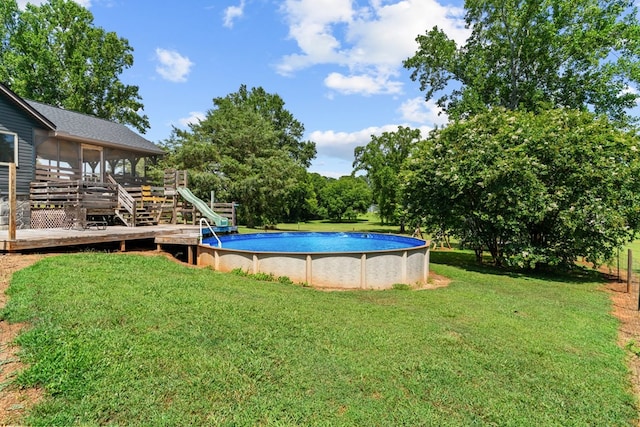 5120 Cleveland Hwy, Cohutta, GA 30710 - outdoor pool featuring a sunroom, a deck, a lawn, a water slide, and stairway