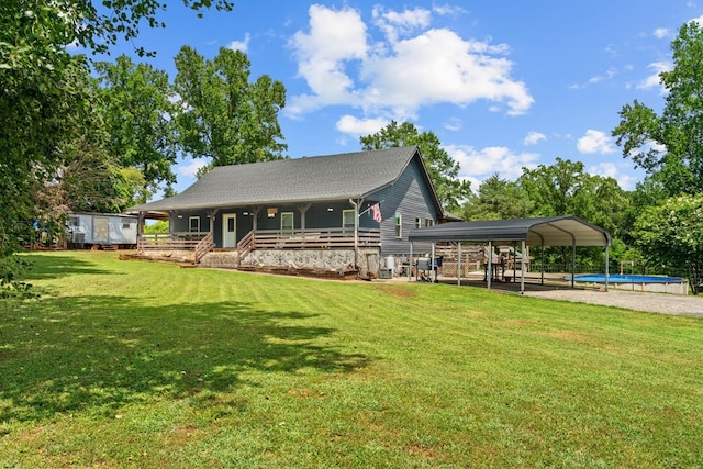5120 Cleveland Hwy, Cohutta, GA 30710 - view of front of house featuring a front lawn, a detached carport, an outdoor pool, and covered porch