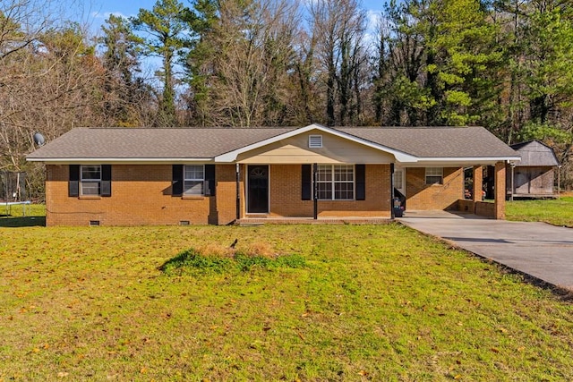 ranch-style home with a carport, a porch, and a front lawn