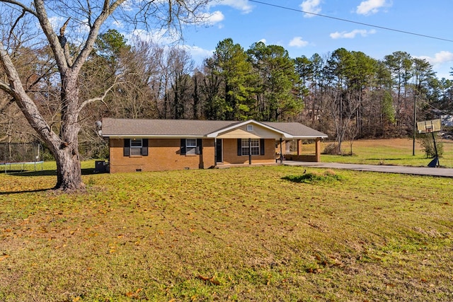 ranch-style house with a front lawn and a carport