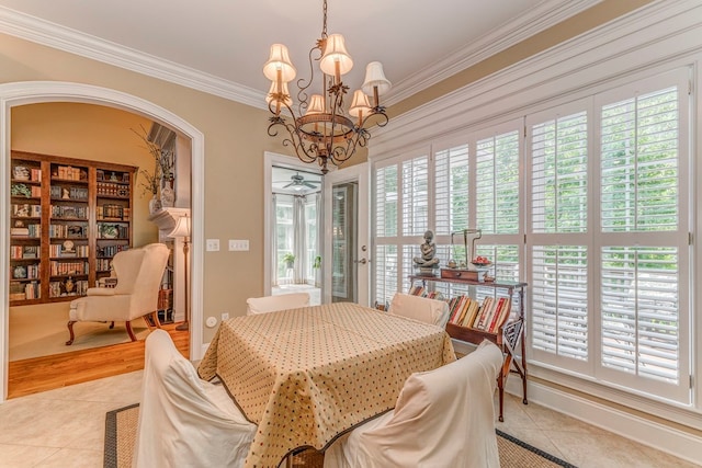 1909 Keystone Way, Dalton, GA 30720 - dining area featuring ornamental molding, light tile patterned floors, a chandelier, arched walkways, and a ceiling fan
