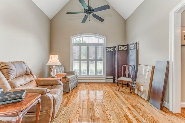 1909 Keystone Way, Dalton, GA 30720 - living area featuring wood finished floors, a ceiling fan, and high vaulted ceiling