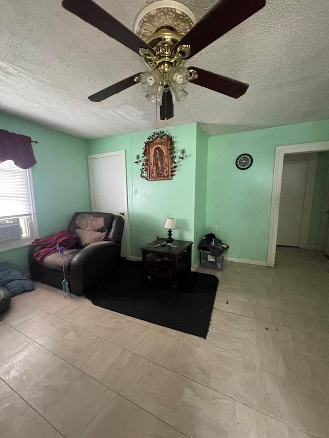 116 Butterfield Dr, Dalton, GA 30721 - living room featuring a textured ceiling, a ceiling fan, and cooling unit