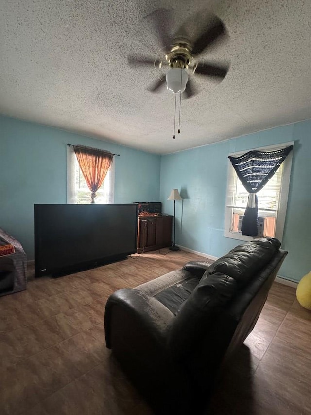 116 Butterfield Dr, Dalton, GA 30721 - living area featuring a ceiling fan and a textured ceiling