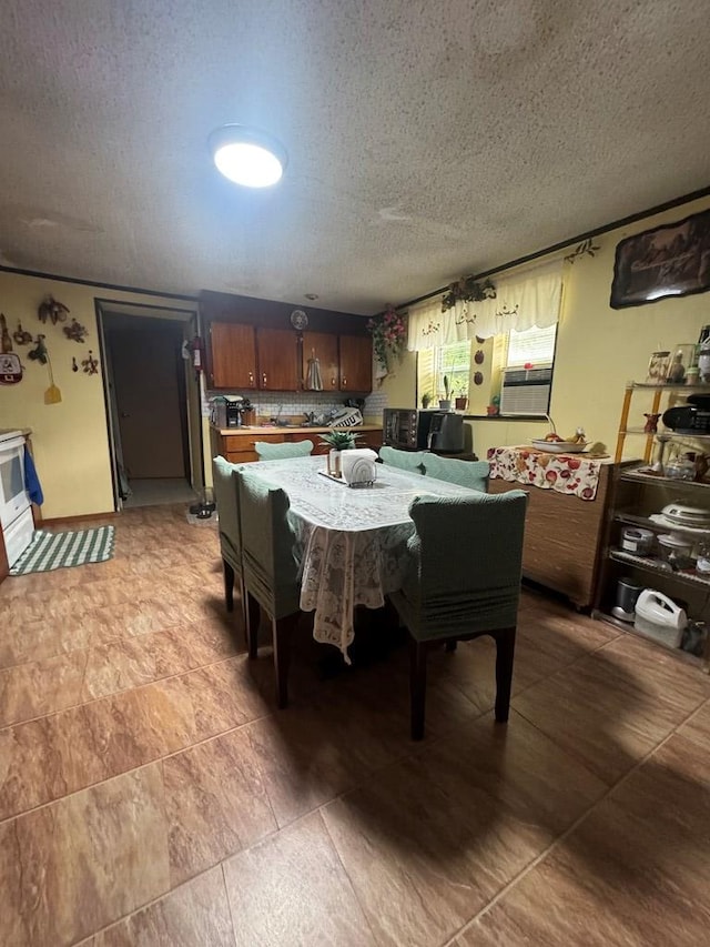 116 Butterfield Dr, Dalton, GA 30721 - dining area featuring a textured ceiling and light tile patterned flooring