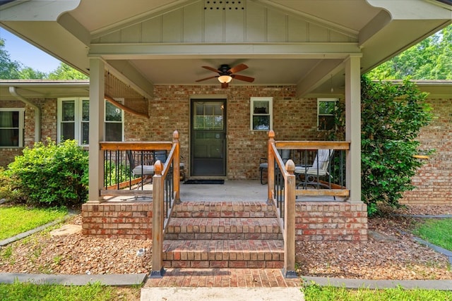 3932 Tibbs Bridge Rd, Dalton, GA 30721 - property entrance with a ceiling fan, brick siding, and board and batten siding