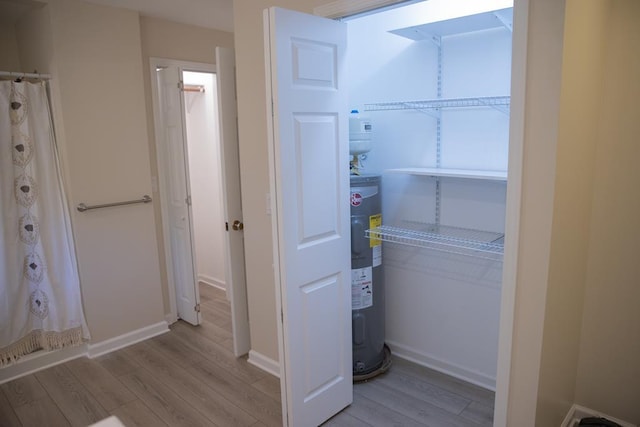 closet featuring electric water heater