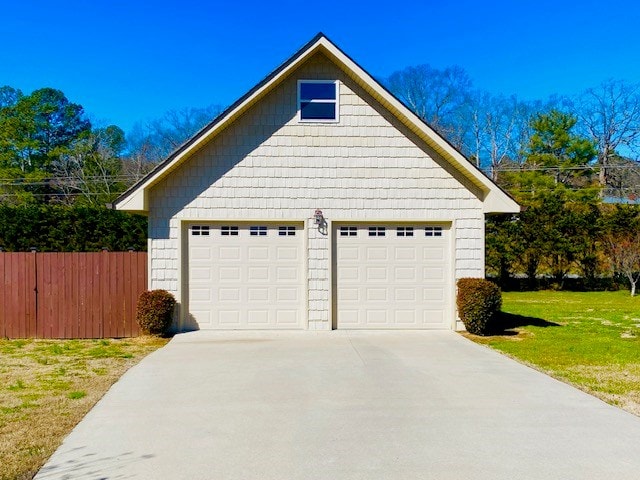 garage with fence