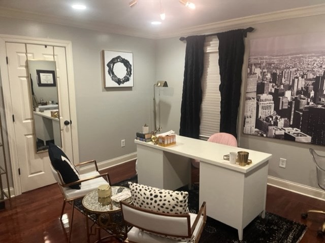 home office featuring crown molding and dark hardwood / wood-style flooring