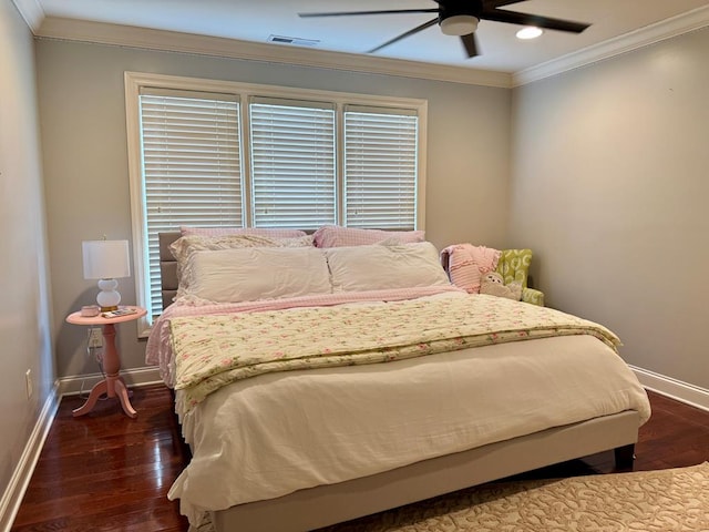 bedroom with multiple windows, crown molding, dark hardwood / wood-style floors, and ceiling fan