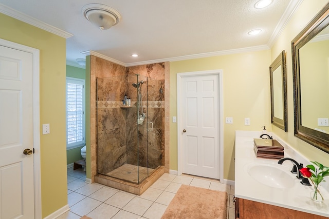 bathroom featuring vanity, a shower with shower door, ornamental molding, and toilet