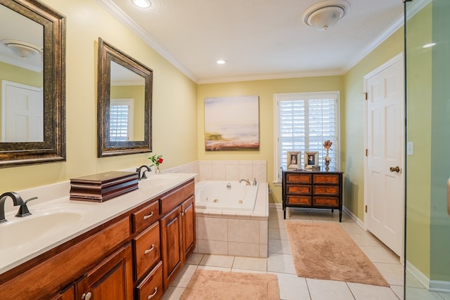 bathroom featuring tile patterned flooring, tiled tub, vanity, and ornamental molding