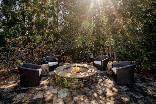 view of patio with a fire pit