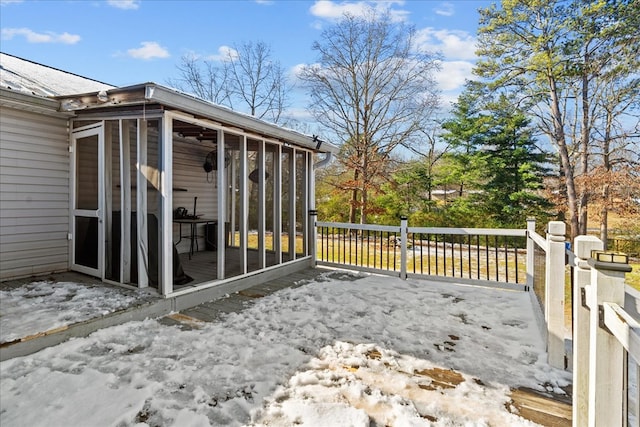 wooden terrace with a sunroom