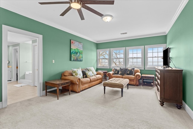 living room with baseboards, carpet, visible vents, and ornamental molding