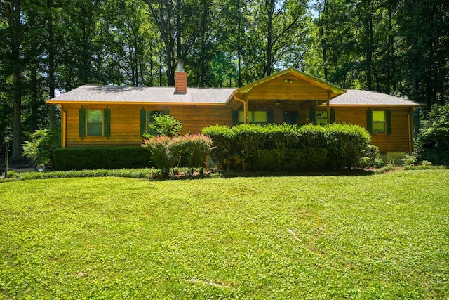 66 Ellis Dr, Chatsworth, GA 30705 - view of front of home with a chimney and a front yard