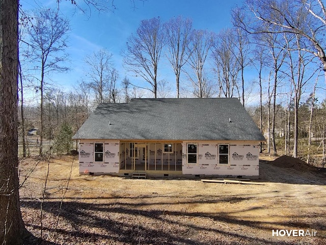 rear view of house with a porch