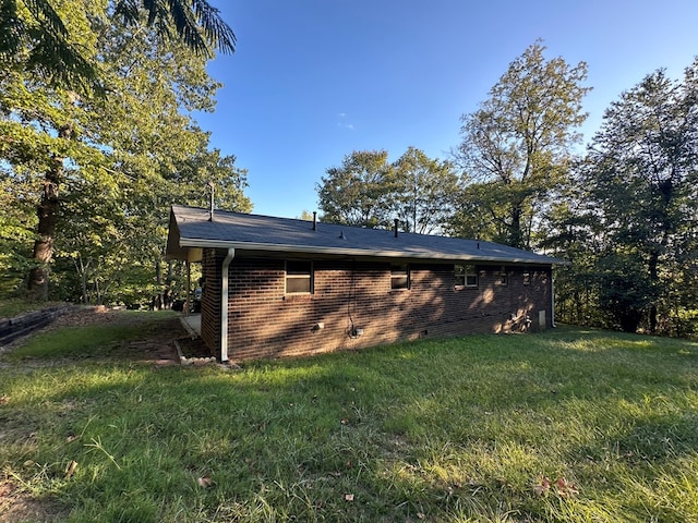 view of home's exterior featuring a lawn