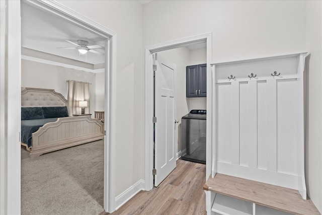 mudroom with ceiling fan and light wood-type flooring