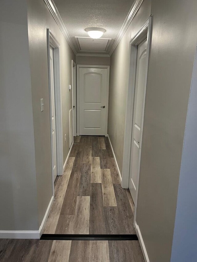 830 Chattanooga Rd, Cohutta, GA 30710 - corridor with wood finished floors, crown molding, and a textured ceiling
