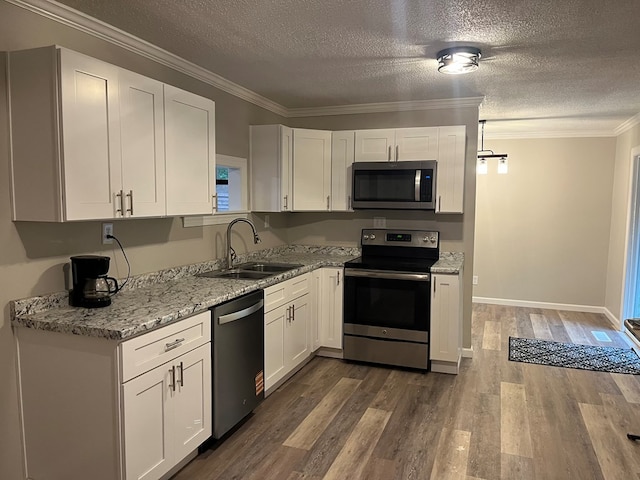 830 Chattanooga Rd, Cohutta, GA 30710 - kitchen featuring stainless steel appliances, white cabinetry, a textured ceiling, dark wood-type flooring, and light stone countertops