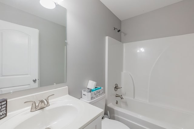 full bathroom featuring vanity, toilet, and shower / bathing tub combination