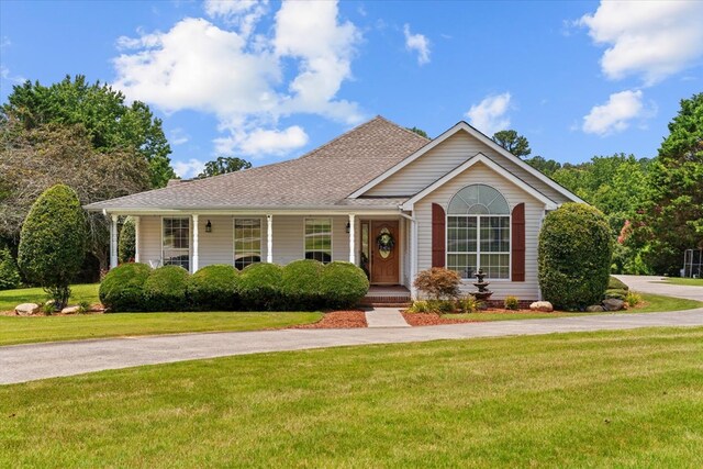 217 Valley Rd, Chatsworth, GA 30705 - view of front of property with a front yard, covered porch, and a shingled roof