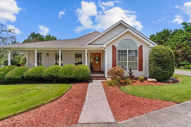 217 Valley Rd, Chatsworth, GA 30705 - single story home featuring a front yard, covered porch, and a shingled roof