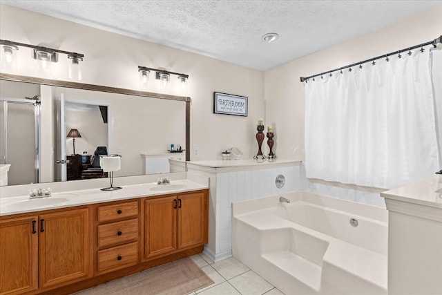 217 Valley Rd, Chatsworth, GA 30705 - bathroom with double vanity, tile patterned flooring, a garden tub, a textured ceiling, and a stall shower