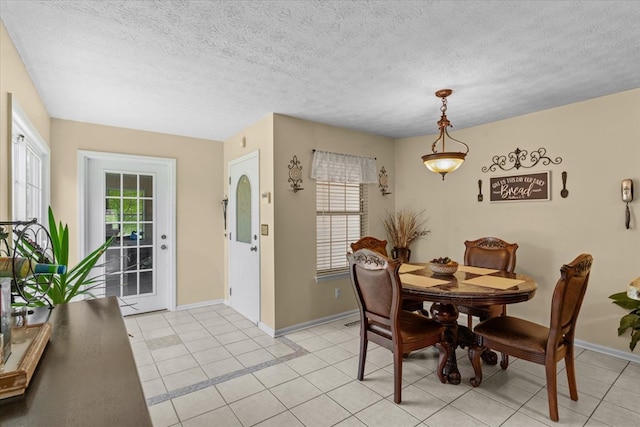 217 Valley Rd, Chatsworth, GA 30705 - dining space with a textured ceiling and light tile patterned flooring