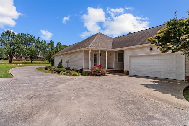 217 Valley Rd, Chatsworth, GA 30705 - view of front of property featuring driveway, a garage, roof with shingles, and a porch