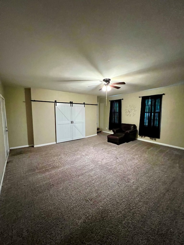 4781 Treetop Ln, Cohutta, GA 30710 - unfurnished living room featuring baseboards, a ceiling fan, and carpet floors