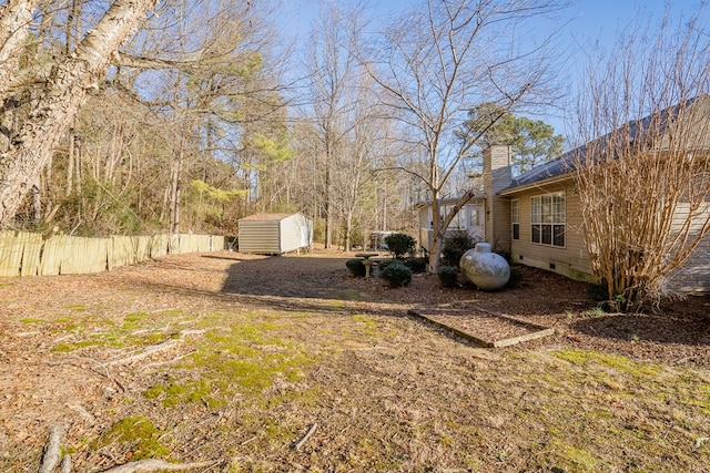 view of yard with a storage shed