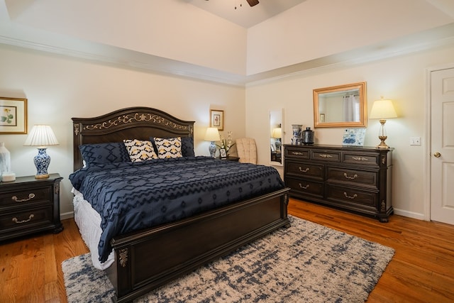 bedroom featuring dark hardwood / wood-style flooring